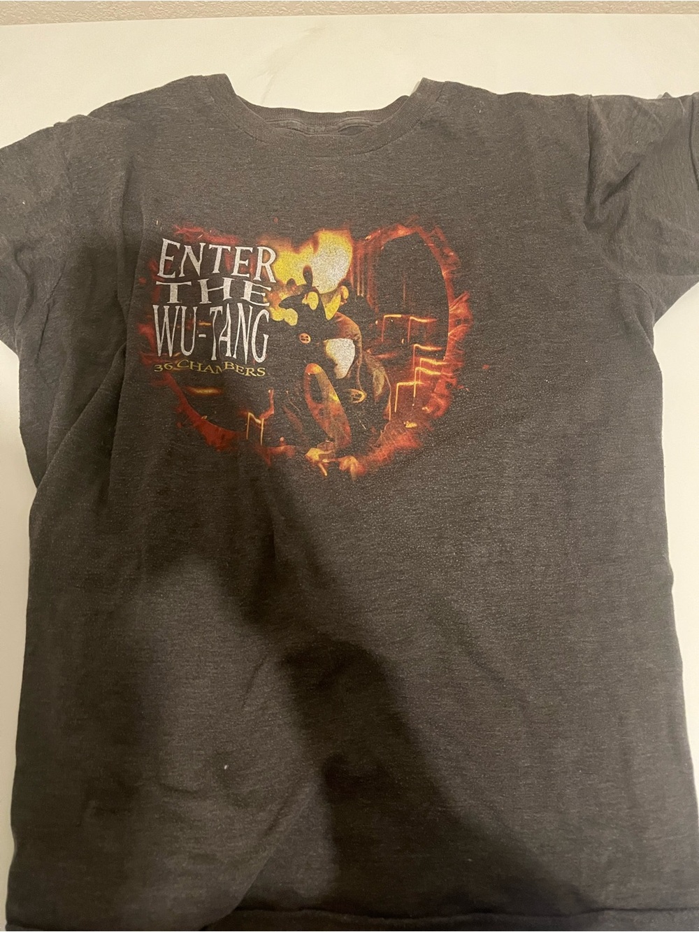 Enter the Wu-Tang Graphic Tee - Black with Red/Orange Accent